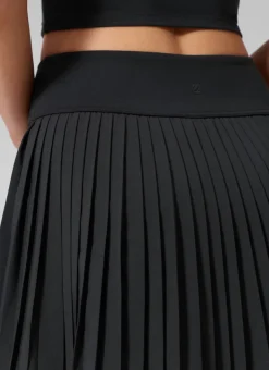 Dual-fabric Pleated Back Mini Tennis Skirt