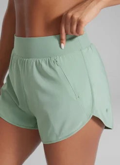 Feathery-Fit Soft Zipper Pocket Dolphin Shorts 3''