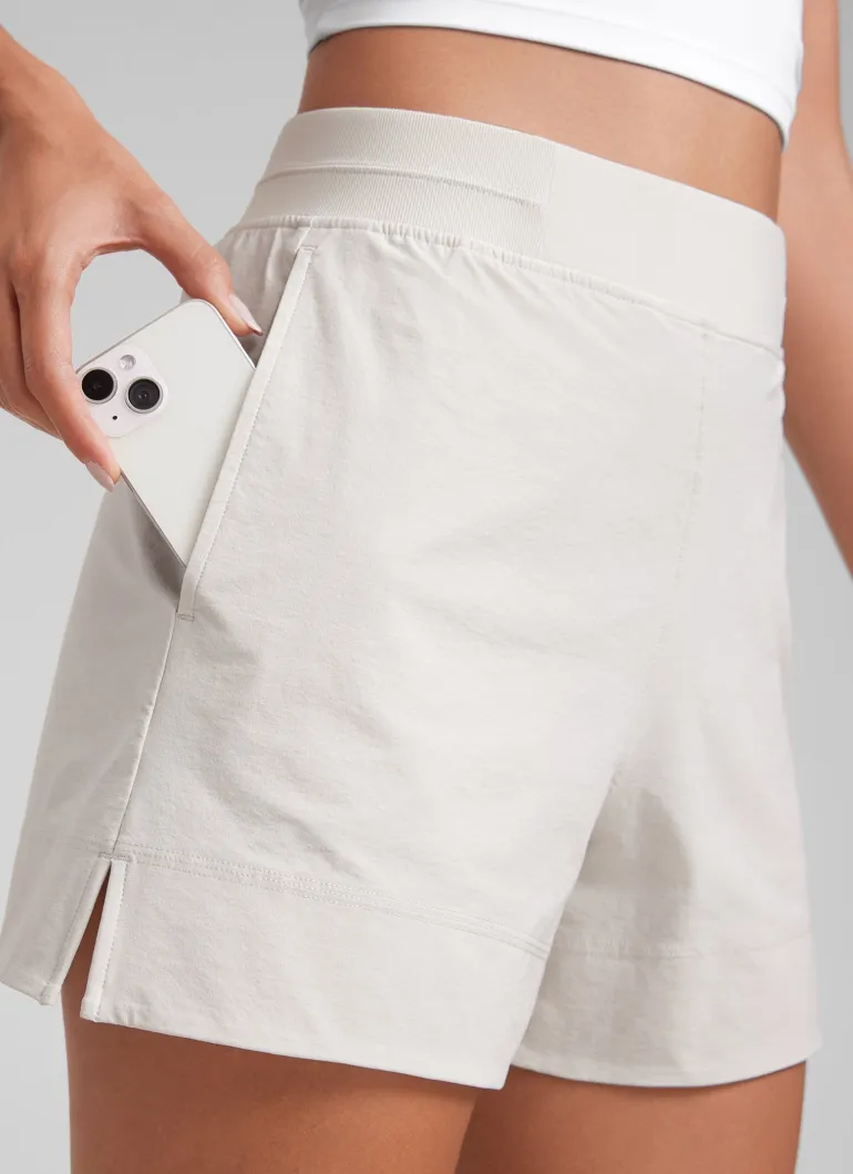 Linerless High Rise V Slit Pocket Shorts 4"