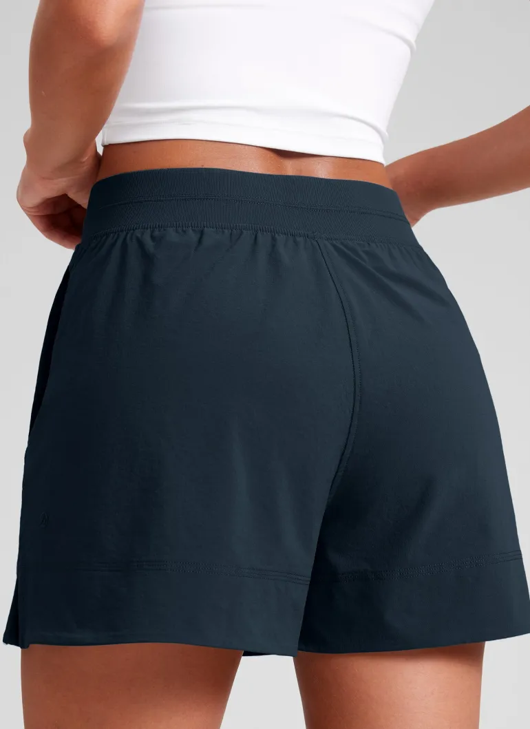 Linerless High Rise V Slit Pocket Shorts 4"